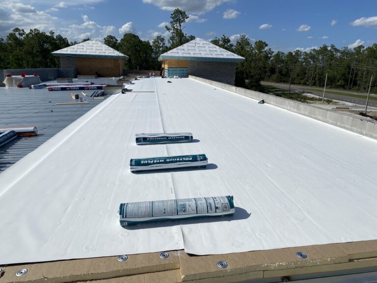 TPO flat roofing installation on a commercial building in Southwest Florida
