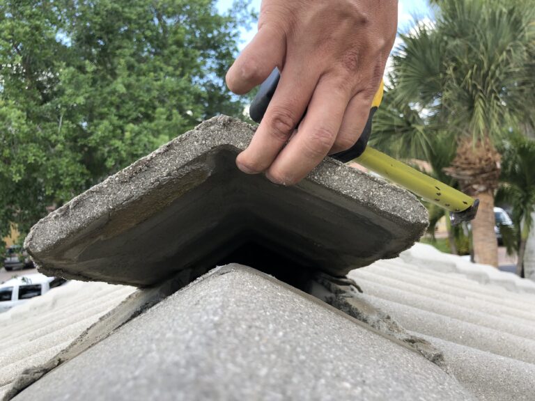 Roofer performing a professional roof inspection on a Southwest Florida home