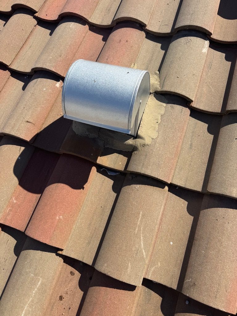 Finished tile roof with new 10 inch gooseneck vent installed in Fiddler's Creek, Naples