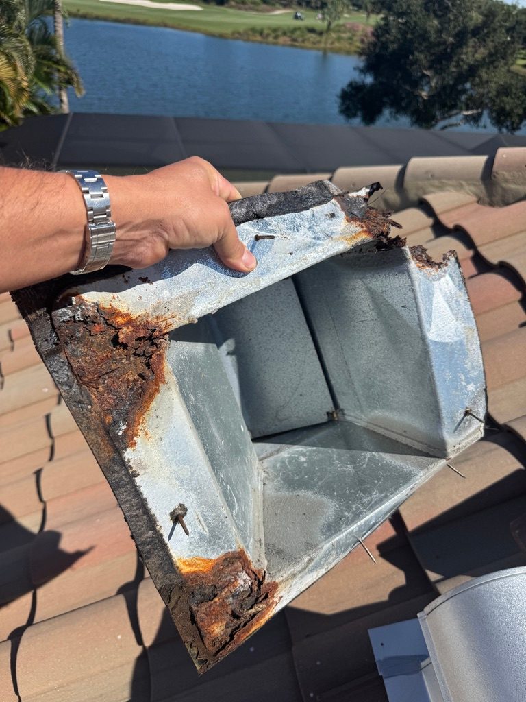 Prematurely rusted gooseneck roof vent removed from a tile roof in Fiddler's Creek, Naples