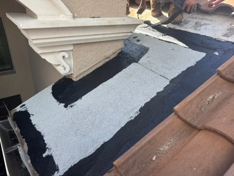 Modified cap sheet sealed into the flashing wall on a Naples tile roof repair
